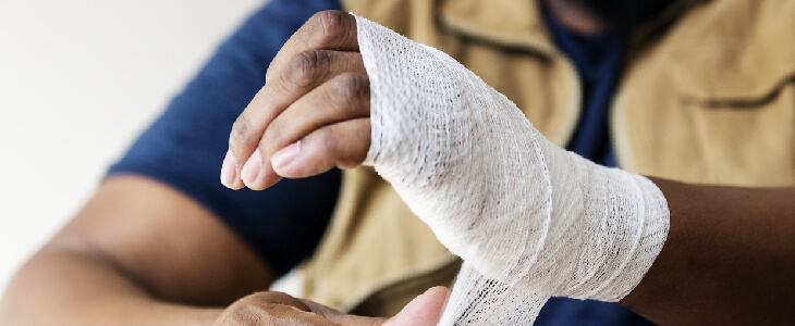 a man wrapping his hand personal injury